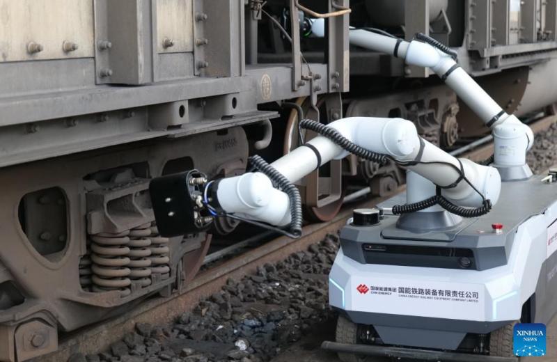 Tas-Logistic | Інновації в залізничній логістиці: у Китаї запустили роботизовану систему огляду вантажних поїздів У порту Хуанхуа, що на півночі Китаю, вперше запрацював інтелектуальний ро